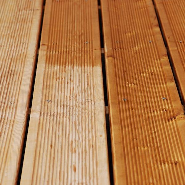 Half coated and half uncoated with SparkleTuff - engineered wood - looks better and is anti-slip and protected