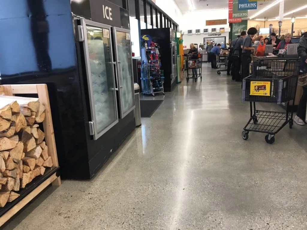 peoples standing on billing counters in a supermarket
