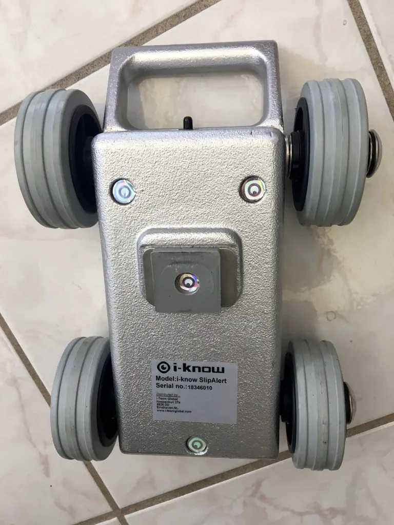 Undercarriage of SlipAlert, showing slider brake