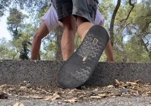 Trip Accident over Asphalt Curb