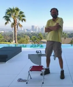 john sotter with the pendulum dcof tester on a pool deck in beverly hills
